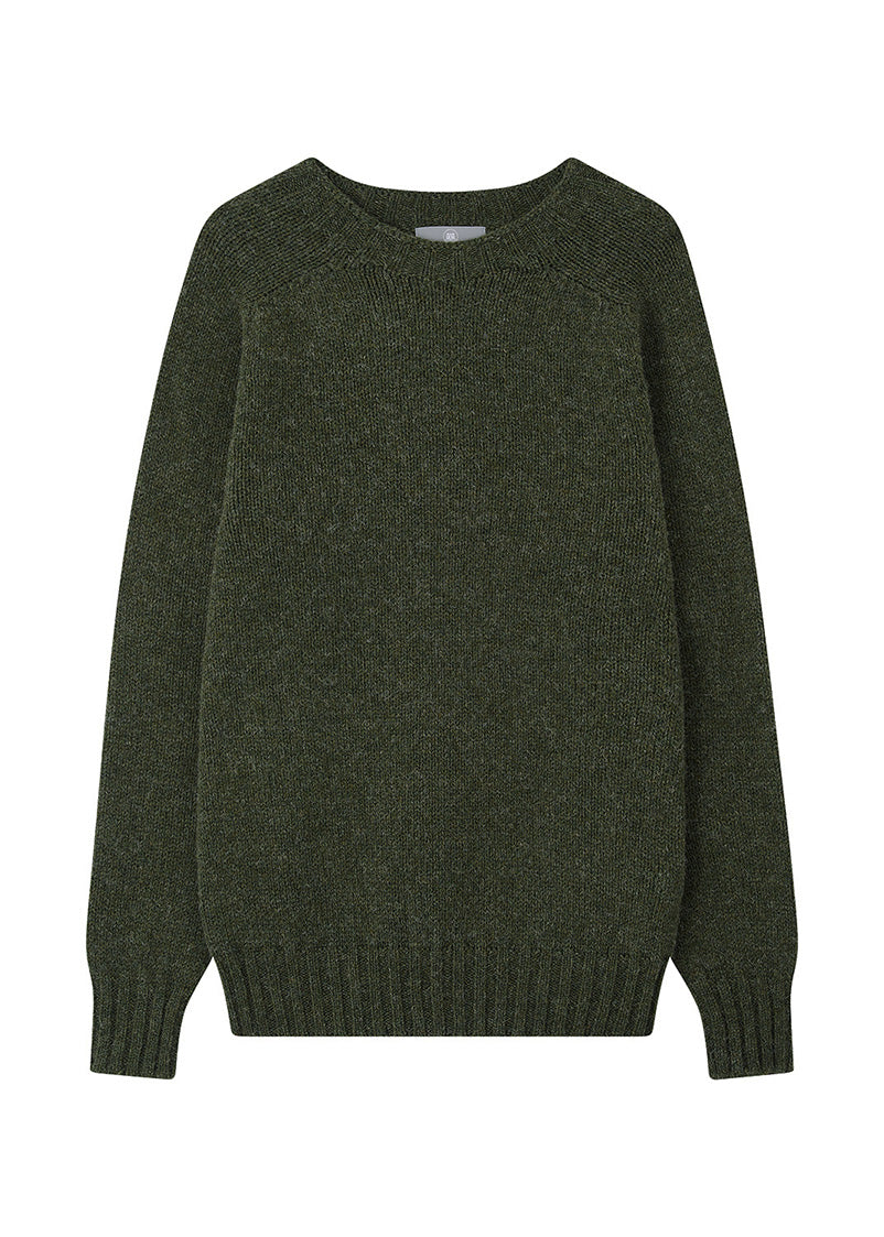 mens green shetland sweater on a white background