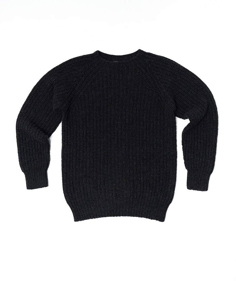 A charcoal gray fisherman's ribbed jumper with long sleeves and a round crew neckline.