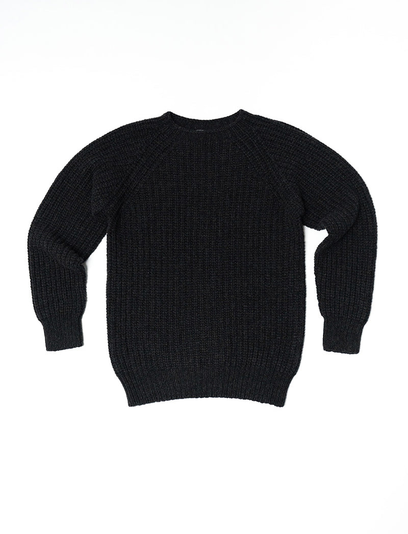 A charcoal gray fisherman's ribbed jumper with long sleeves and a round crew neckline.