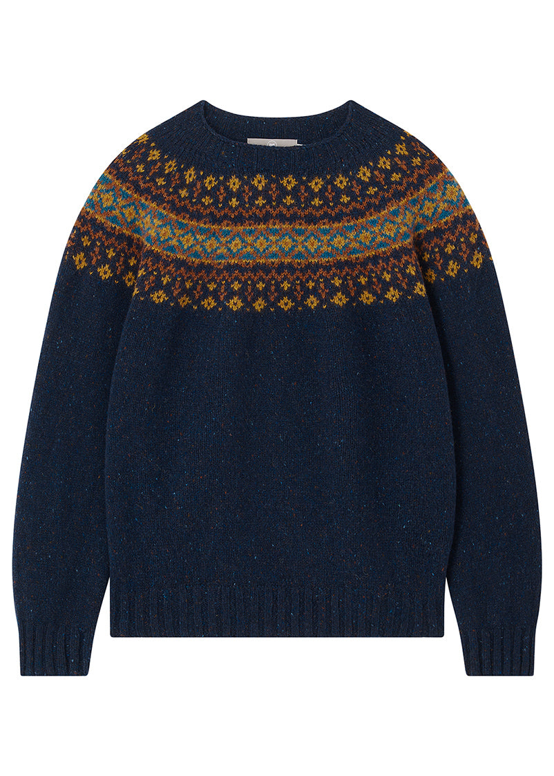 Navy sweater with a autumnal fair isle yoke pattern on a white background