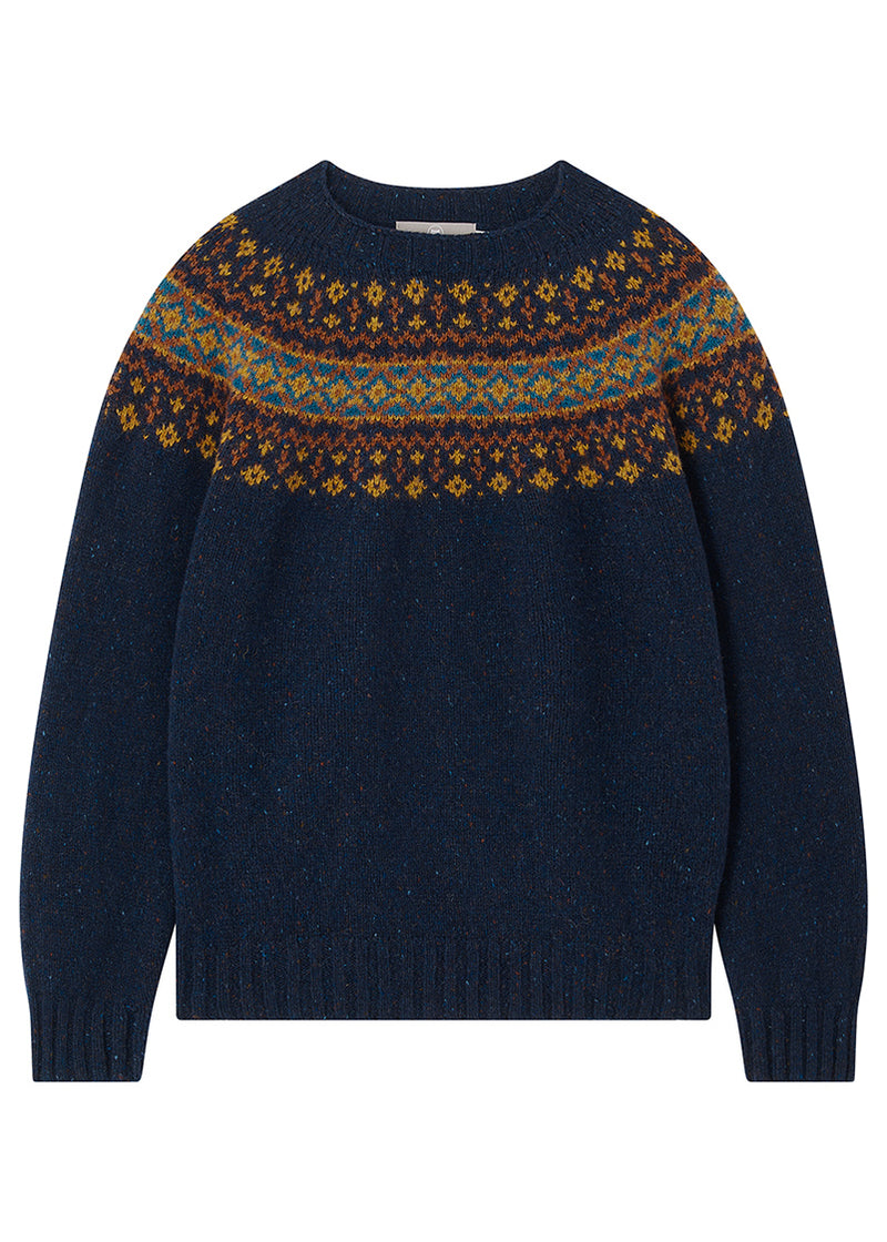 Navy sweater with a autumnal fair isle yoke pattern on a white background
