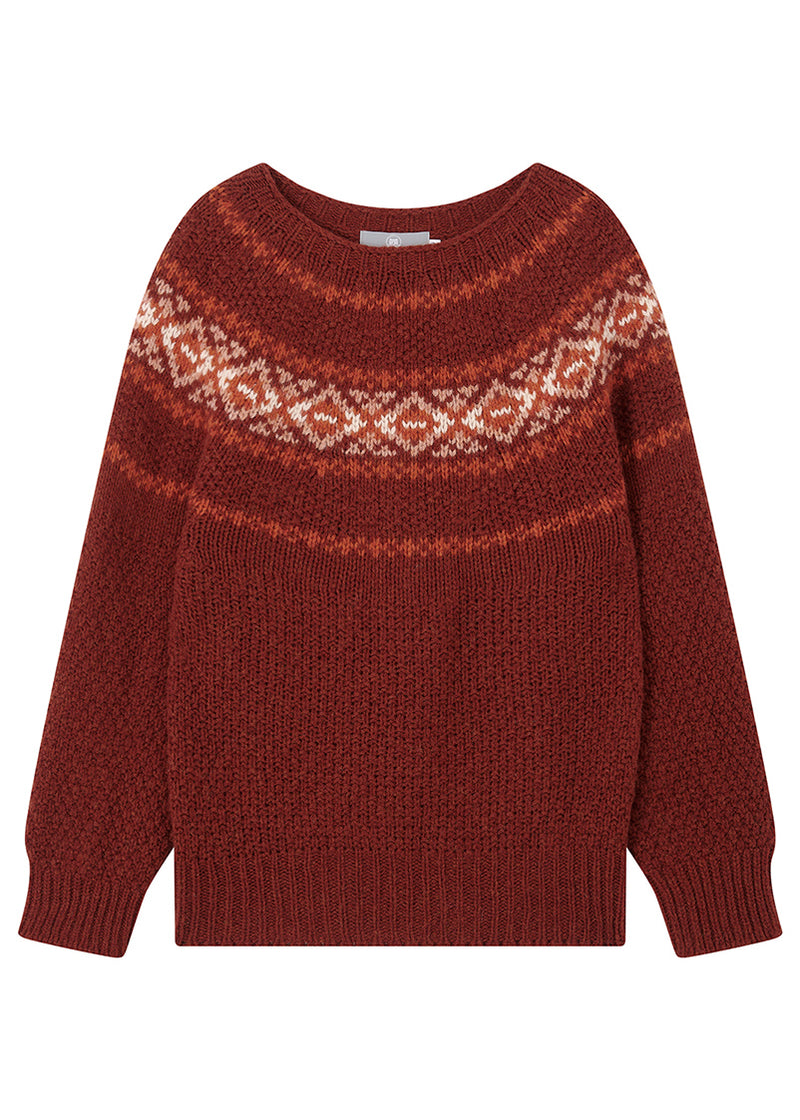 Tonal russet red sweater with a fair isle yoke pattern on a white background
