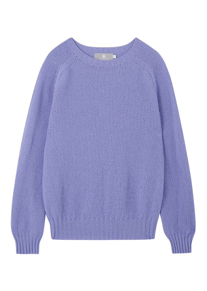 Lilac moss stitch wool sweater on a white background