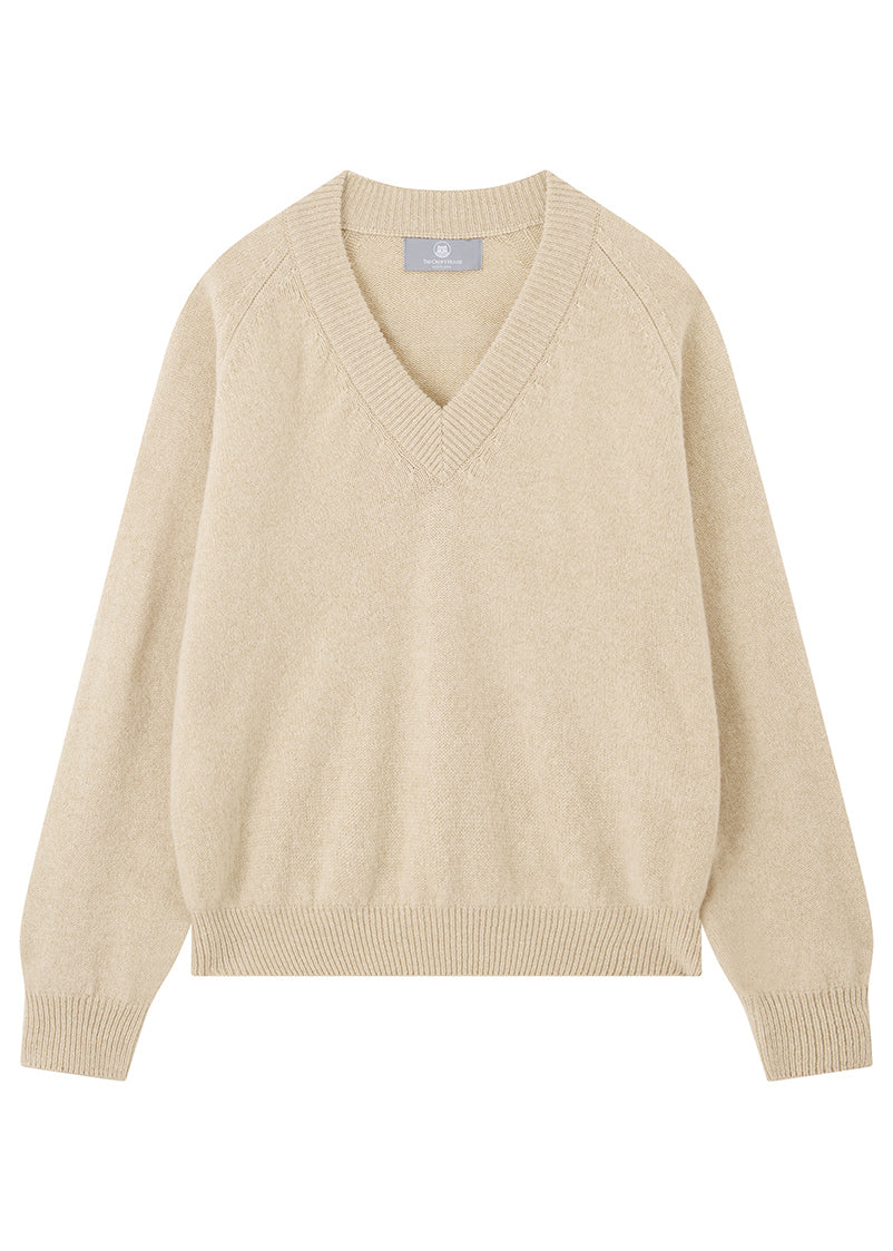 Beige sweater on a white background