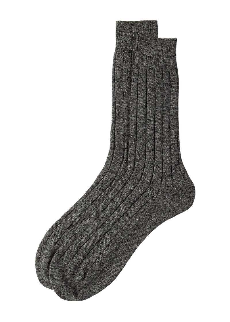 A pair of mens knitted mid grey ribbed cashmere socks on a white background