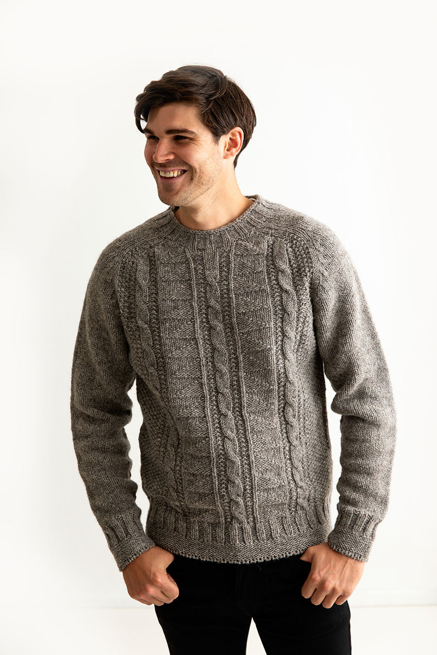 Mens Natural Gansey Jumper knitted in Scotland with cables and textural stitches. Undyed marled wool.
