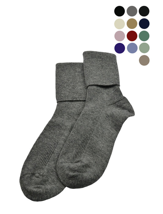 A pair of women's cashmere socks in gray, displayed alongside color swatches indicating available color options including black, ivory, camel, brown, gray, pink, navy blue, lavender, purple, red, and green.